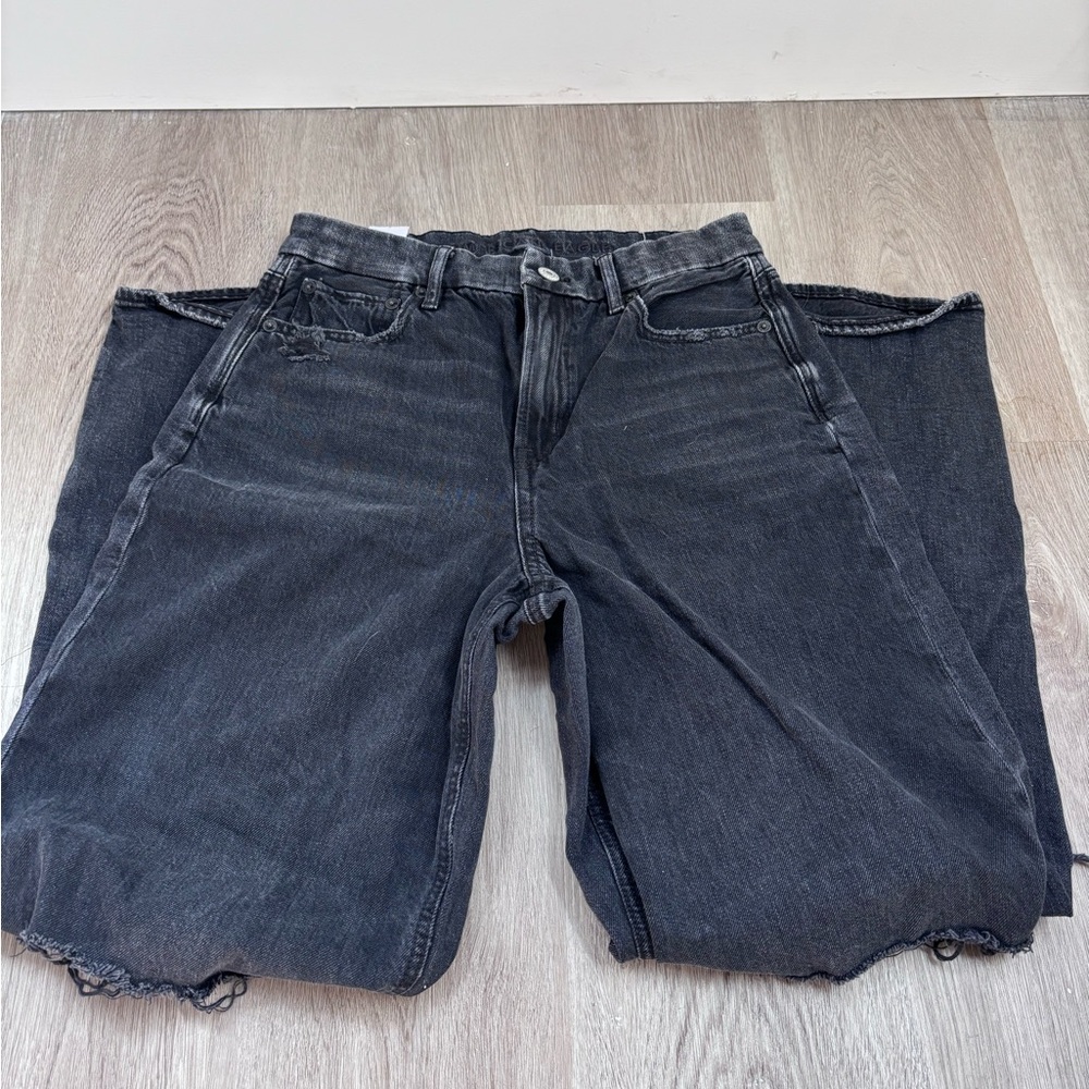 Distressed black denim